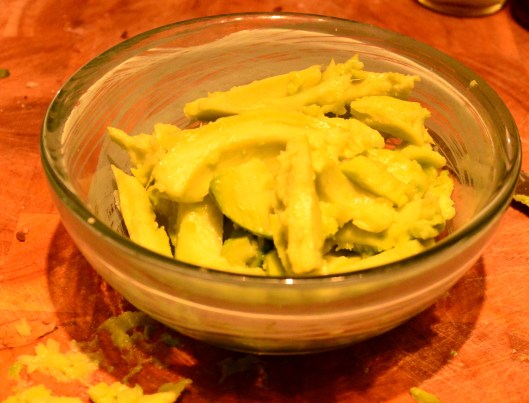 messy board with avocado